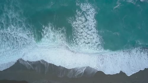 Aerial Top View Turquoise Sea Waves From Bird's Eye View, Ocean Waves Reaching Shore and Splashing