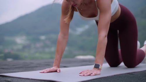 Woman Exercising and Doing Pushups Outdoors