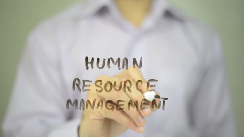 Human Resource Management Text Written on Glass