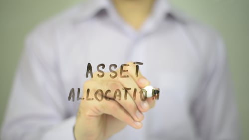 Man Writes Asset Allocation on Clear Surface