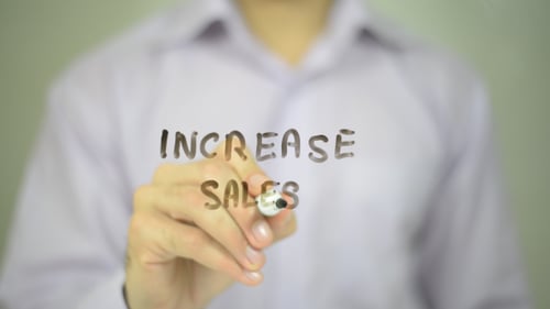 Increase Sales Written on Clear Surface Close Up