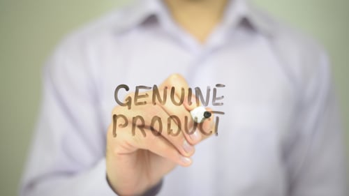 Writing Genuine Product on Clear Surface