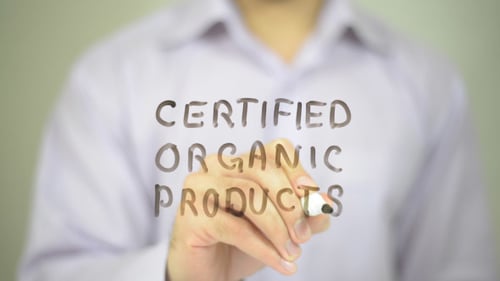 Writing Certified Organic Products on Clear Surface