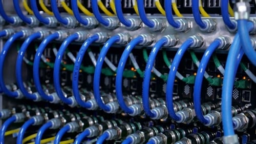 Wires, Lightbulbs And Computer Parts In Render Farm