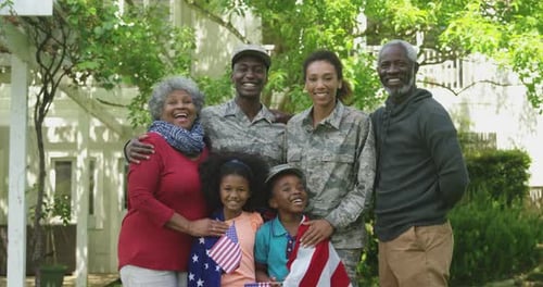 Happy Military Family Posing Together in Backyard