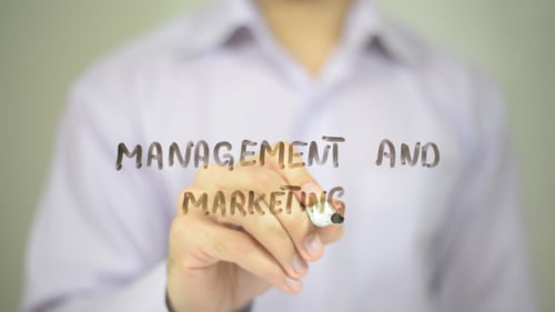 Writing Management and Marketing on Translucent Surface