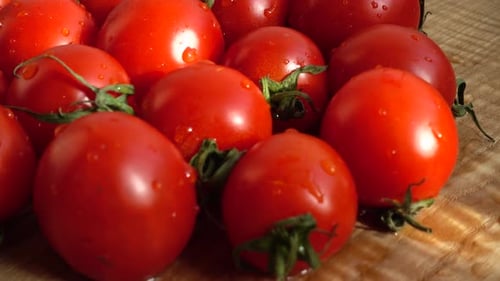 Fresh Red Tomatoes Close-Up on Wooden Background