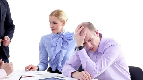 Upset Man in a Corporate Meeting With Team