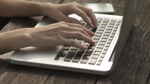 Typing Computer Laptop On Wooden Desk