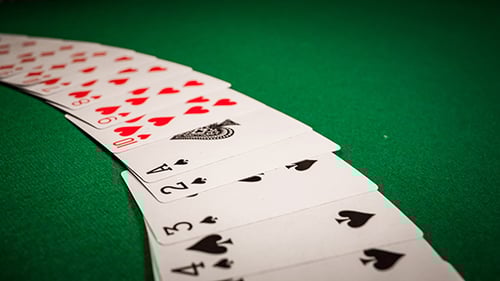 Playing Cards Laid Out in Suits