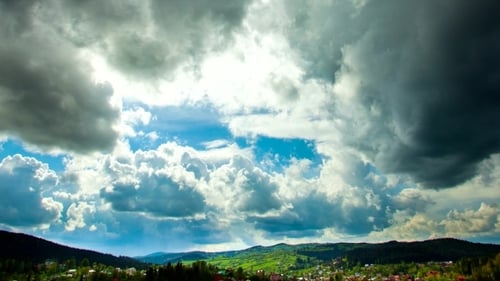 Clouds Over The Forest, Houses And Mountain