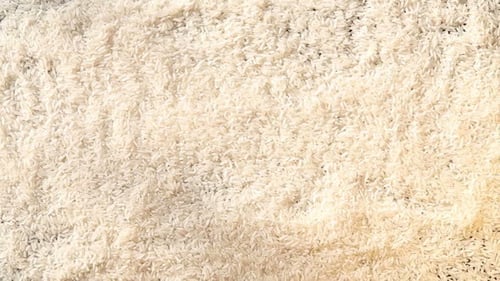 Rice Hand Draws Letters and Heart