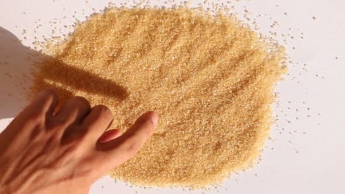 Drawing a Heart in Brown Sugar Granules