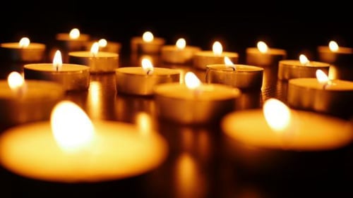 Calming Candles Flicker in the Dark