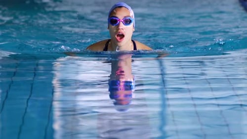 Swimmer training in a swimming pool