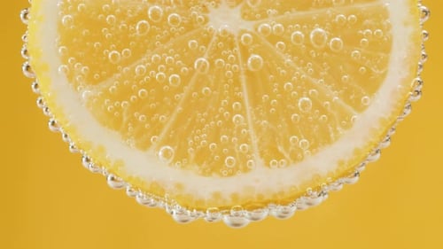 Close Up Lemon Slice in Sparkling Water