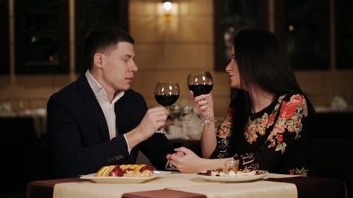 Romantic Date Loving Couple In a Restaurant
