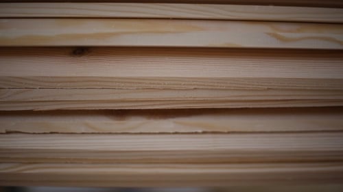 Close Up of Stacked Light Wood Boards