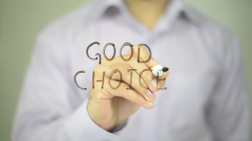 Hand Writes "Good Choice" on Transparent Surface