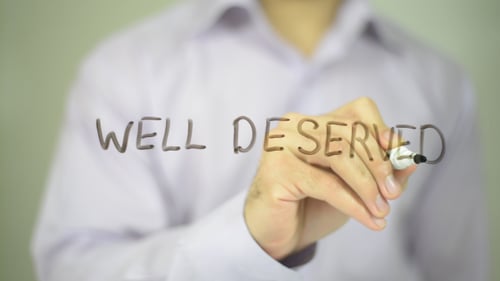 Hand Writes Well Deserved with Marker