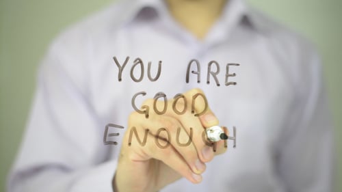 Person Writing You Are Good Enough Message