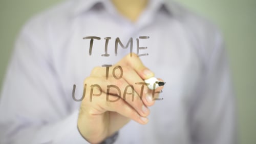 Time to Update message written on a clear surface