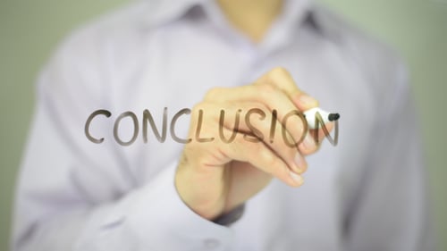 Man Writes Conclusion with Black Marker