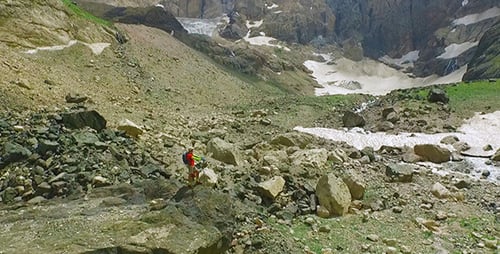 Hiker Exploring Rugged Mountain Wilderness