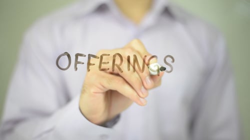 Offerings Word Written on Clear Surface