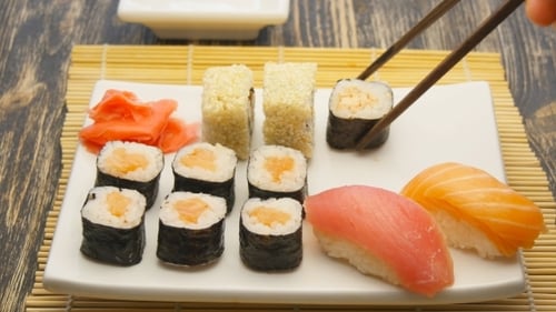 Appetizing Sushi Selection with Chopsticks