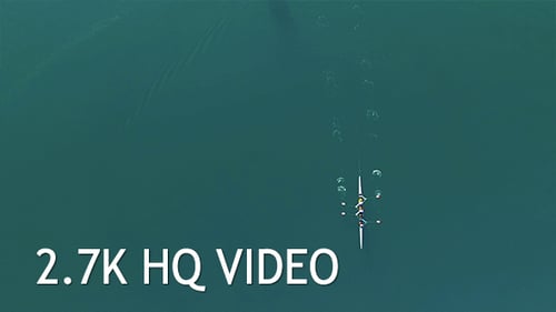 Aerial View of Rowboat Team on Open Ocean