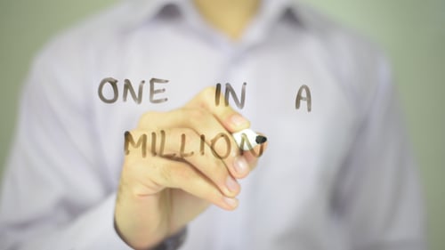 Writing 'One in a Million' on Clear Surface