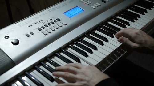 Man Playing The Piano