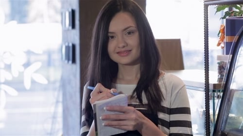 Portrait Of a Young Waitress Taking An Order