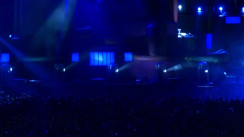 Exciting Concert with Crowd and Stage Lighting