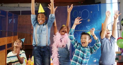 Children Celebrate With Confetti and Balloons at Party