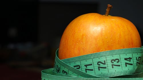 Apple Wrapped with a Measuring Tape for Health
