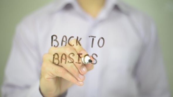 Hand Writes Back to Basics on Clear Surface, Business, Corporate Stock ...