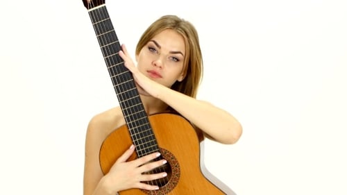 Blonde Woman Posing with Guitar in White Studio