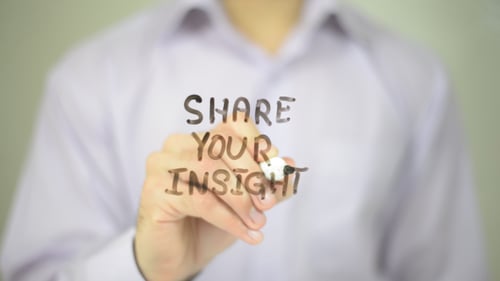 Hand Writes 'Share Your Insight' on Screen