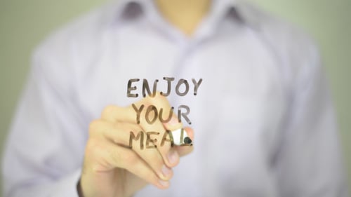 Writing Enjoy Your Meal Message on Glass