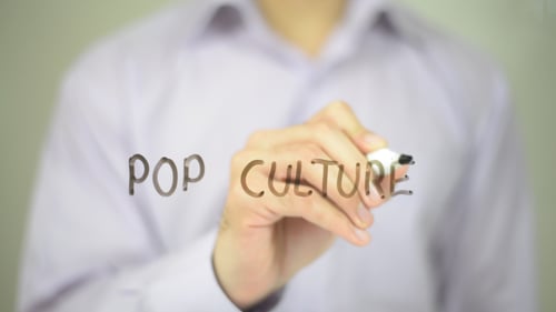 Writing Pop Culture With a Marker on Glass