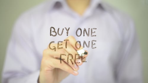 Hand Writing "Buy One Get One Free" with Marker