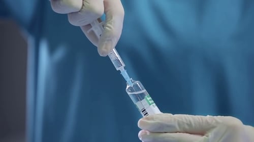 Doctor Gains a Medicine Into a Syringe
