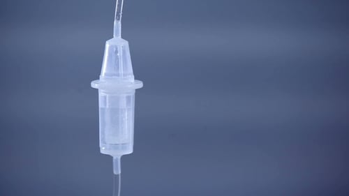 Close Up of IV Fluid Drip Chamber