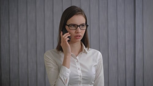 Young Adult Woman Talking on Cell Phone