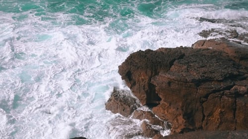 Ocean Waves Breaking On Rock