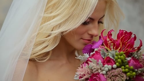 Bride Holding Wedding Bouquet Close Up
