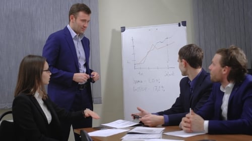 Business Meeting Presentation at Office With Four Adults