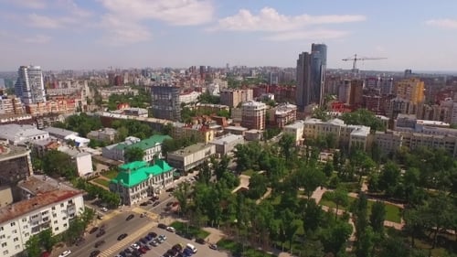 Aerial Camera Flies Over City